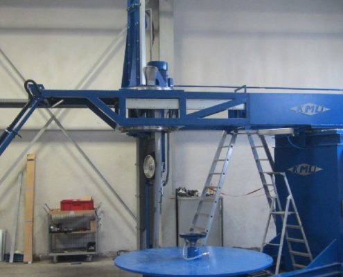 Belt grinding machine with turning device for the processing of boiler bottoms (BöSM – 4500)